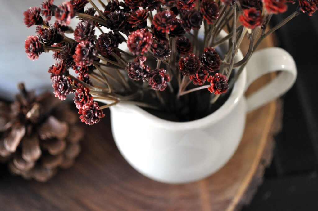 Farmhouse Fall Tour of Homes. Red flowers in pitcher.