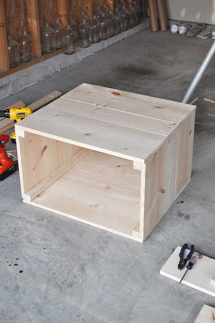 Make these rustic, farmhouse style DIY Crate Side Tables for your living room or bedroom! They are so easy to make! Tutorial here: https://www.littleglassjar.com/2017/04/25/diy-crate-side-tables/