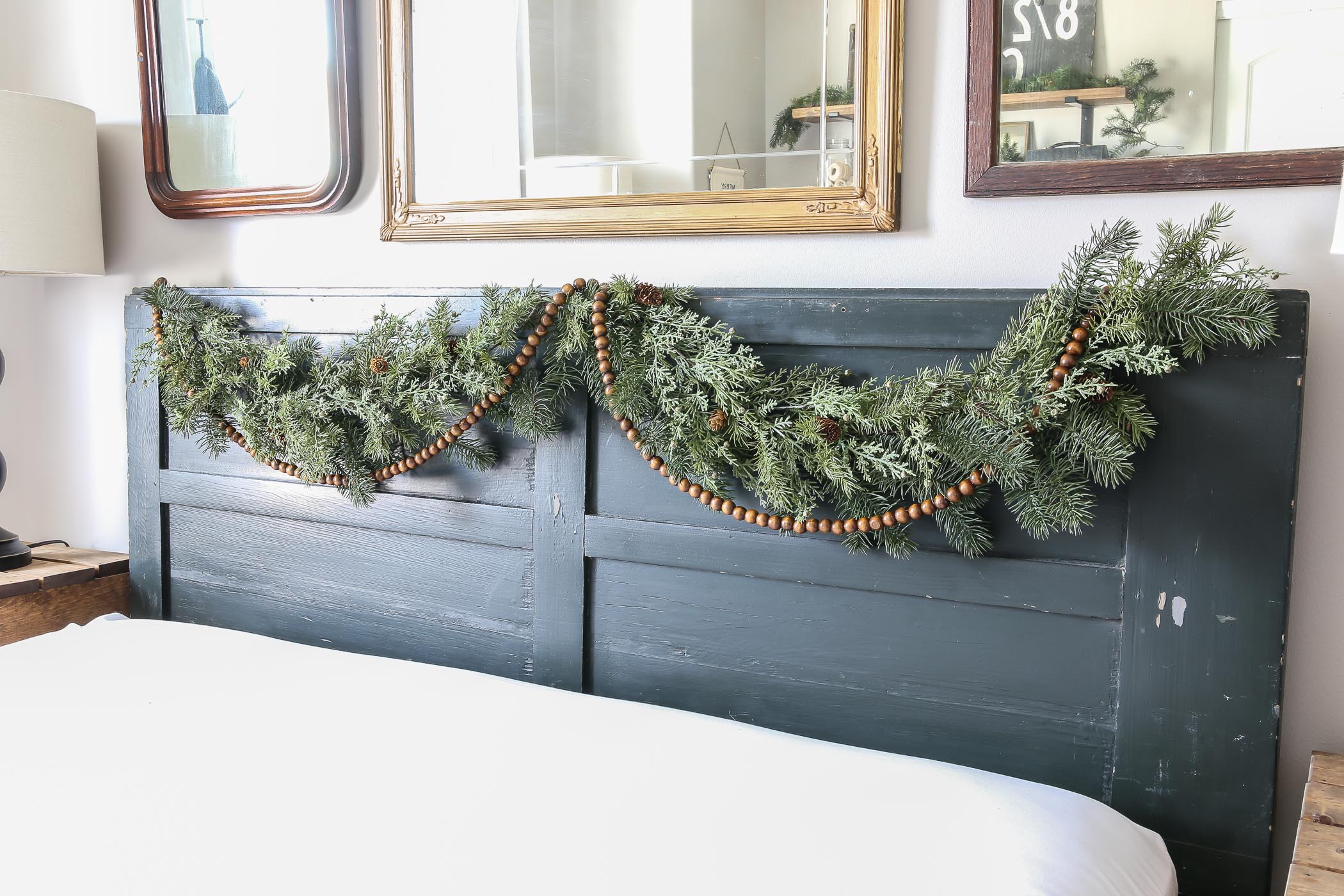 How to Hang Christmas Garland on a Bedroom Headboard